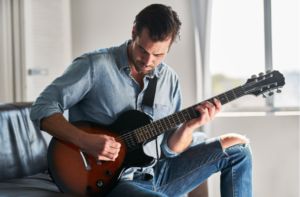 Man playing an electric guitar