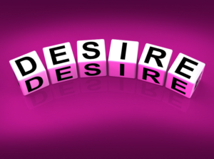 Red background with block letters on it that read Desire.