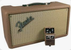 Fender amplifier with a BOSS Fender '63 reverb guitar pedal in front.